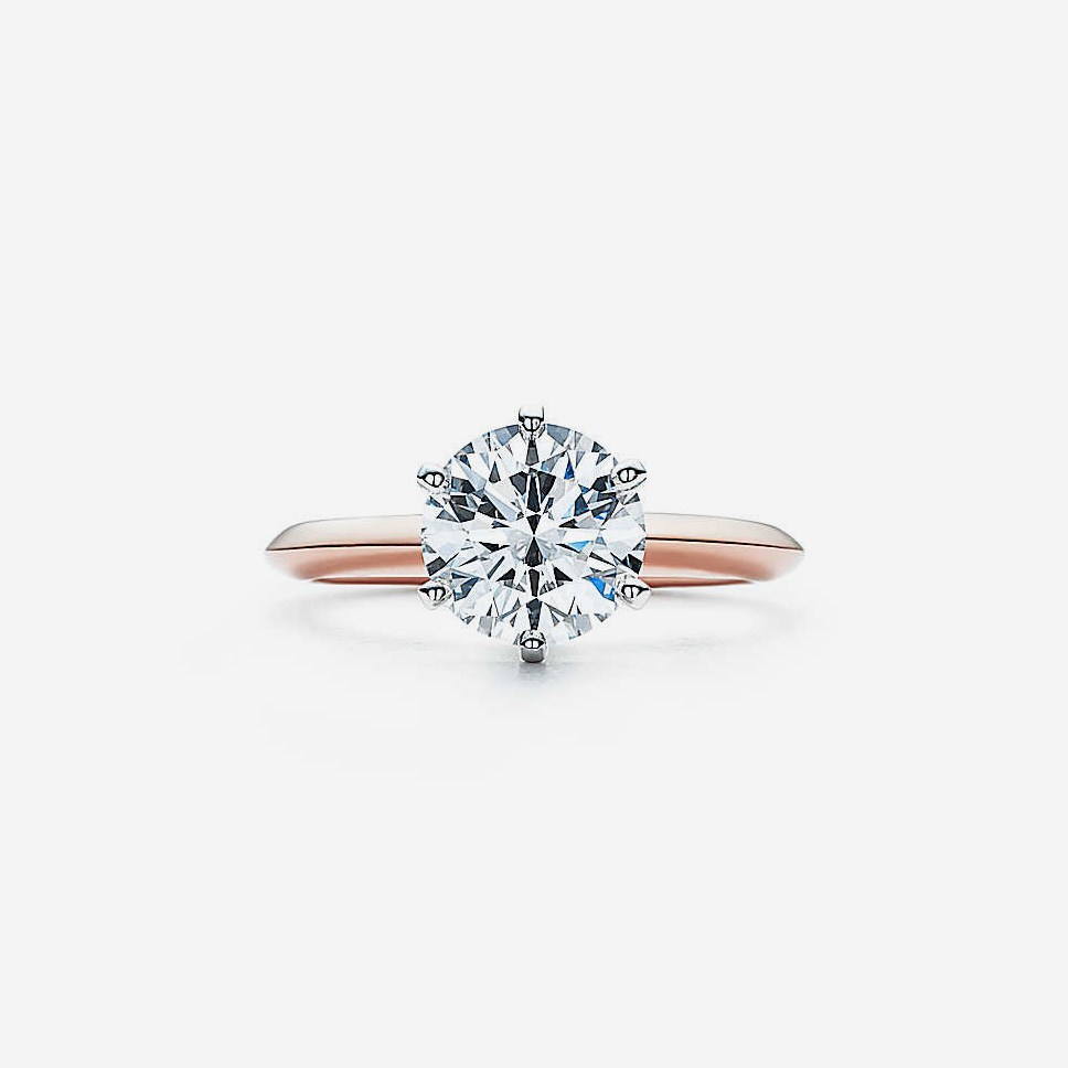 Anillo de compromiso de oro 18K con diamante